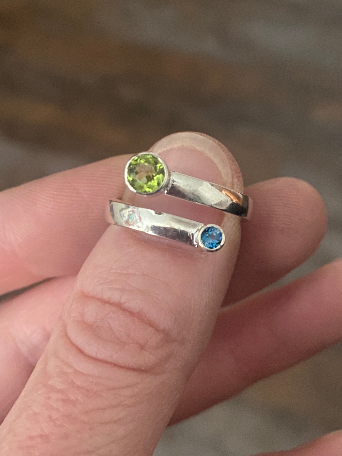 Peridot and blue topaz bypass ring, size 7 1/4, comfort fit band