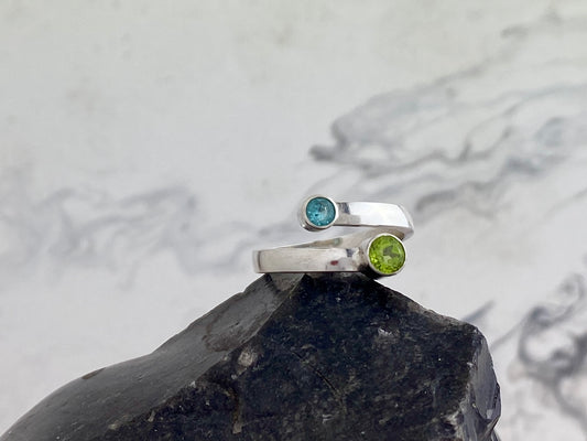 Reserved for Megan- Peridot and blue topaz bypass ring, size 9.5